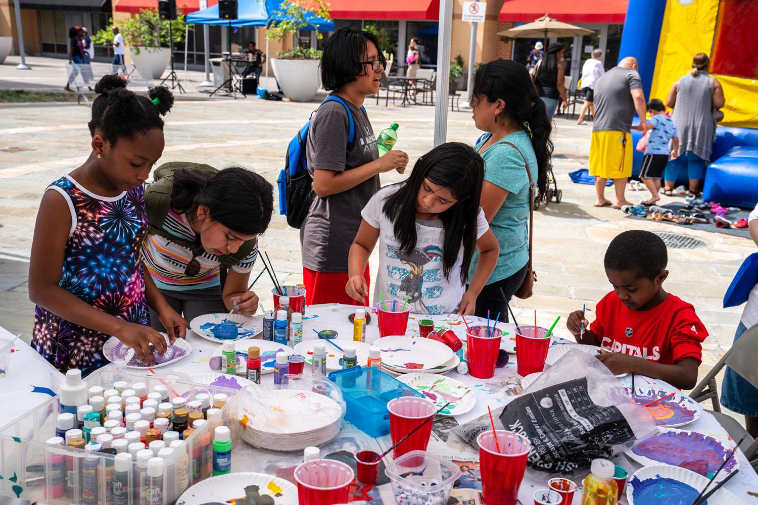 Children painting at the Libraries Rock! block party at the
Hyattsville Branch